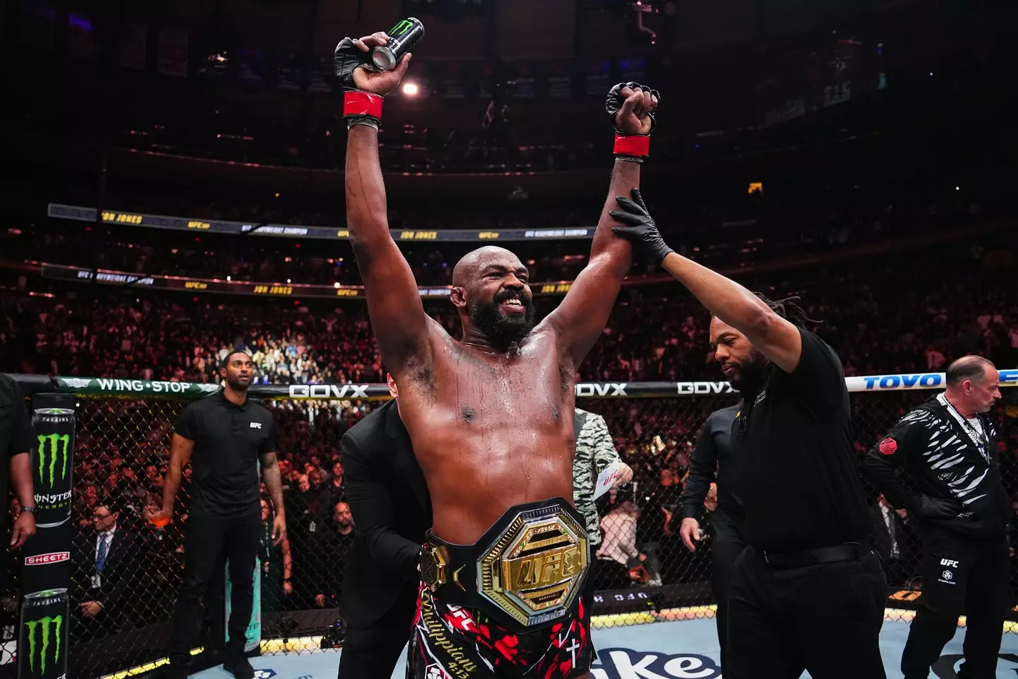 Jon Jones celebrates defending his UFC heavyweight title against Stipe Miocic. Image: Getty
