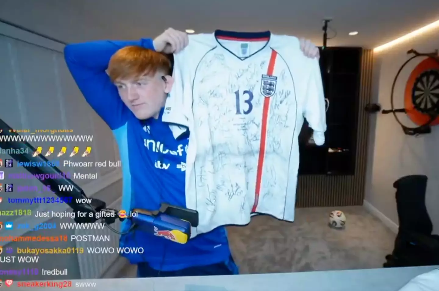 AngryGinge poses with his signed shirt. Image credit: Twitch