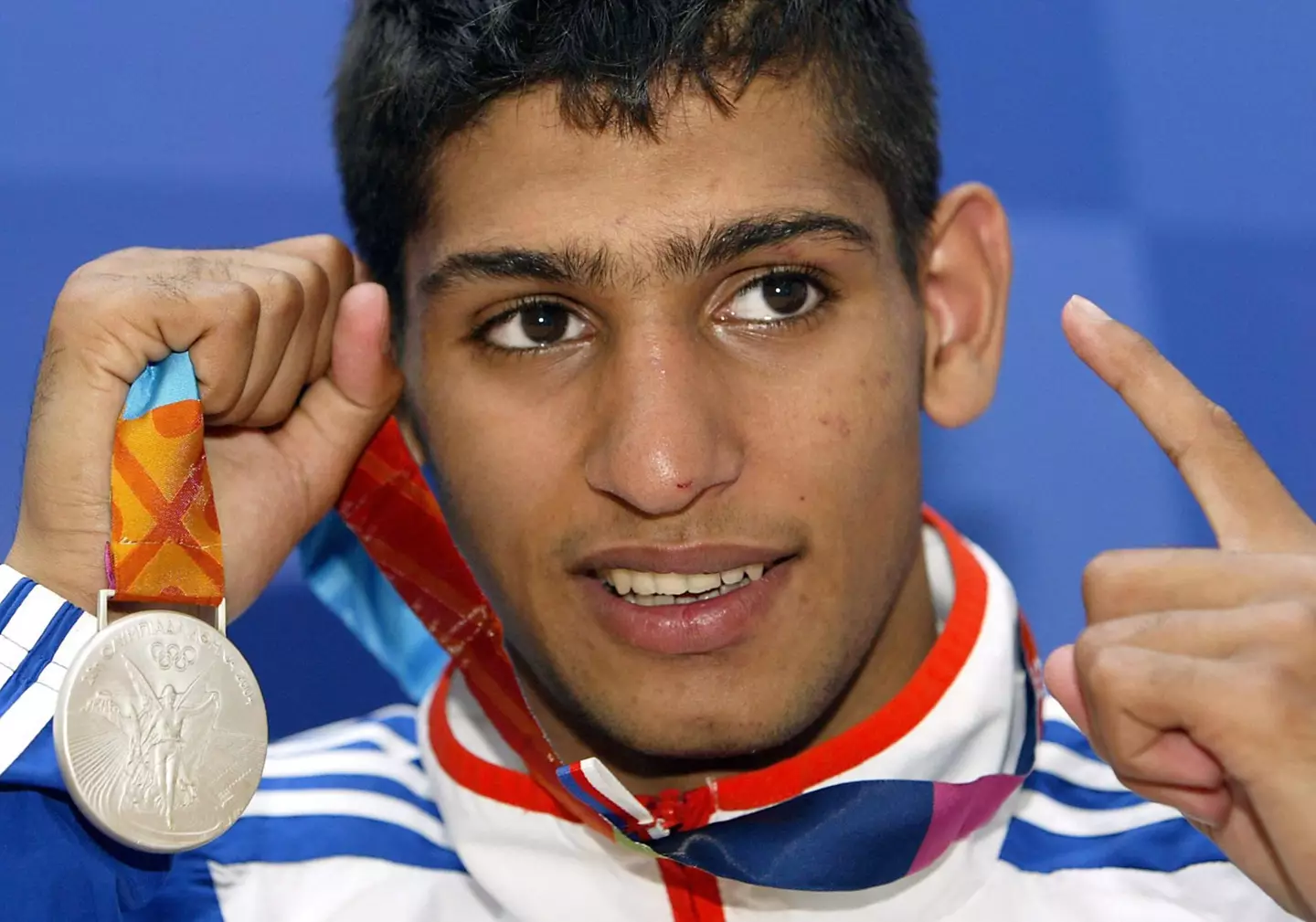 Khan won a silver medal at the Athens Olympic Games in 2004 (Image: PA)
