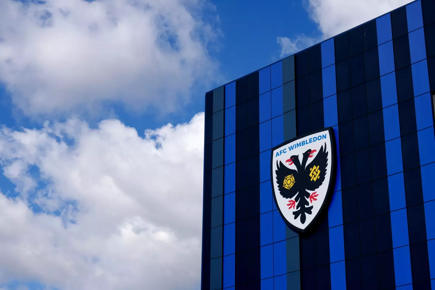 AFC Wimbledon's badge at the Cherry Red Records Stadium