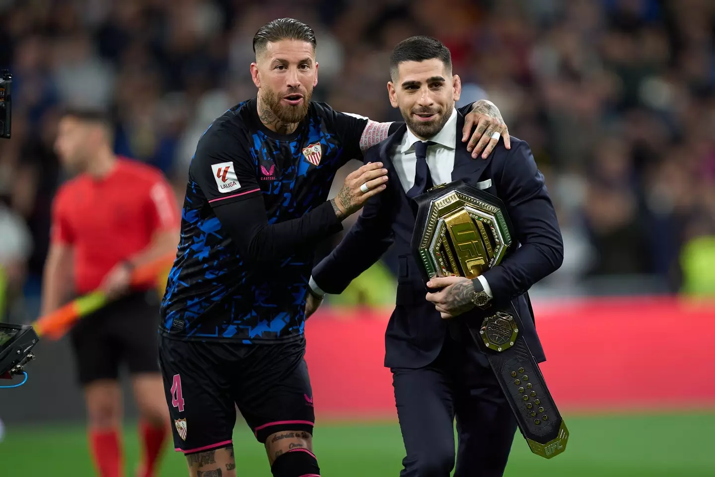Ilia Topuria with Sergio Ramos as he parades his UFC title at the Bernabeu. Image: Getty