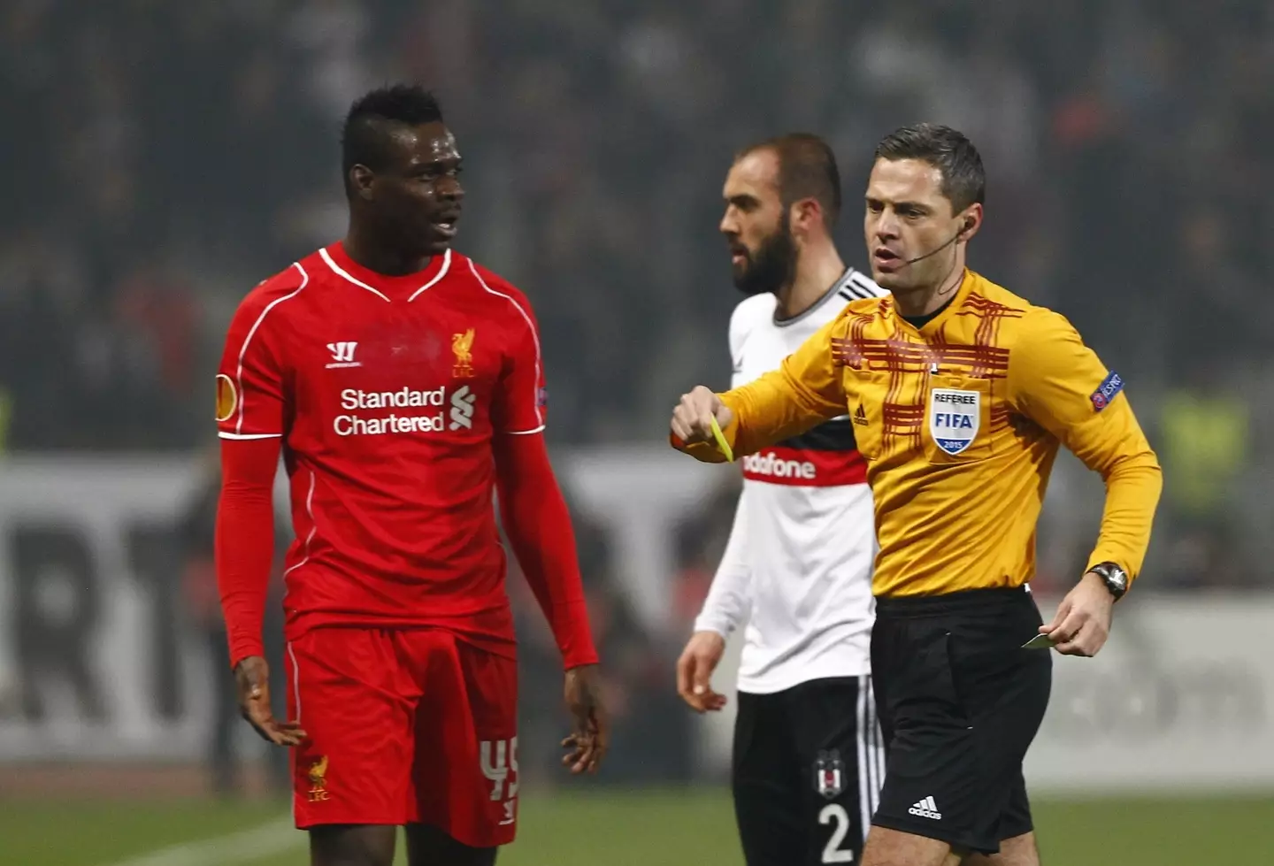 Mario Balotelli receives a yellow card playing for Liverpool. Image: Getty 