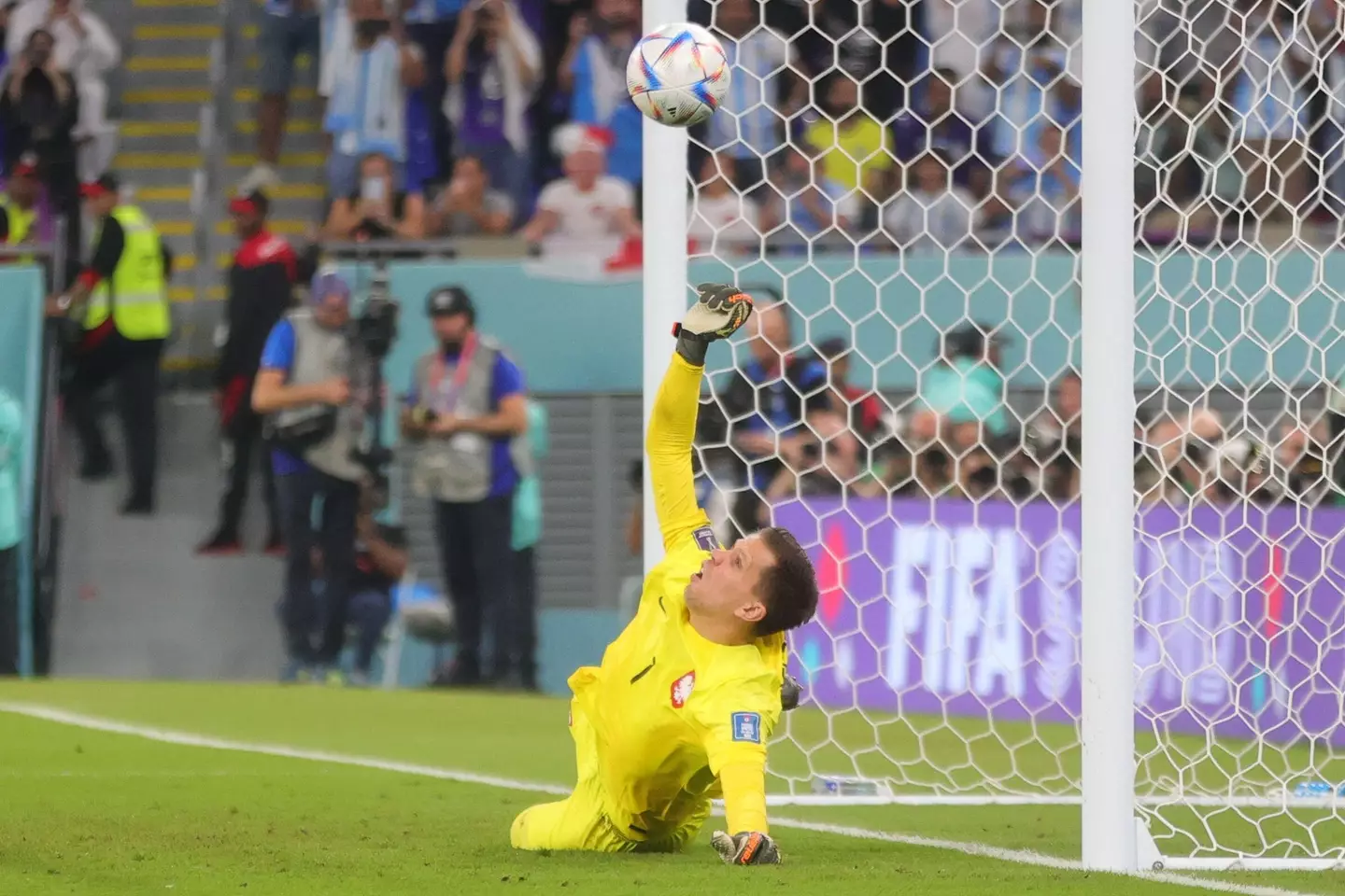  Szczesny pulls off a terrific save to stop Messi from opening the scoring in Doha. Image credit: Alamy