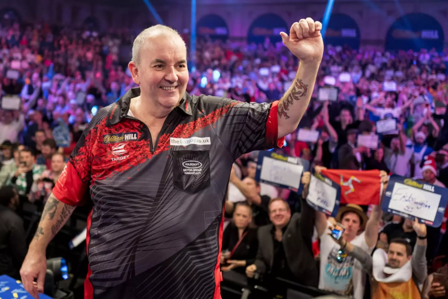 Taylor is widely viewed as the GOAT of darts (Image: Getty)