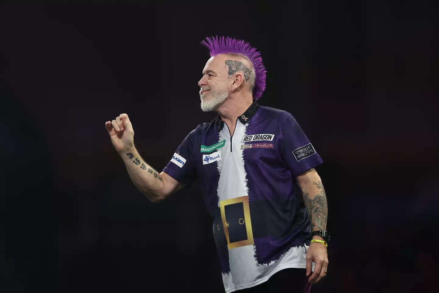 Peter Wright is out of the 2026 PDC World Darts Championship. Image: Getty