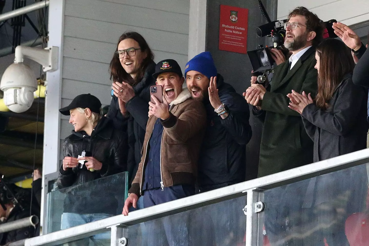 Reynolds and Mcelhenney enjoying a Wrexham game. Image: Alamy