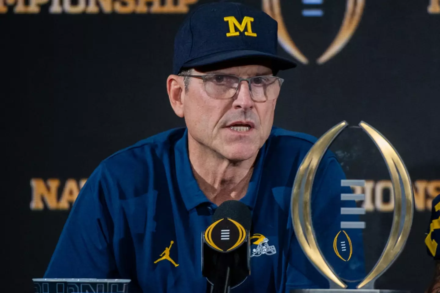 Michigan coach Jim Harbaugh has been linked with the role (Image: Getty)