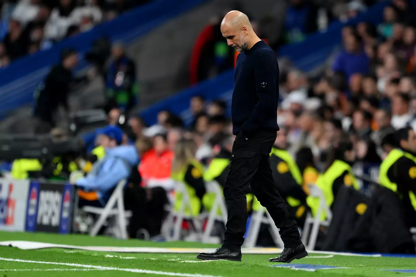 Guardiola cut a dejected figure on the Bernabeu touchline. Image credit: Getty