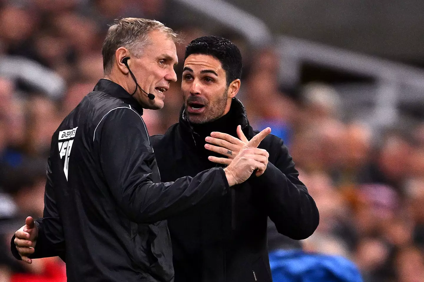 Arteta in discussion with fourth official Graham Scott during the Newcastle game. (Image