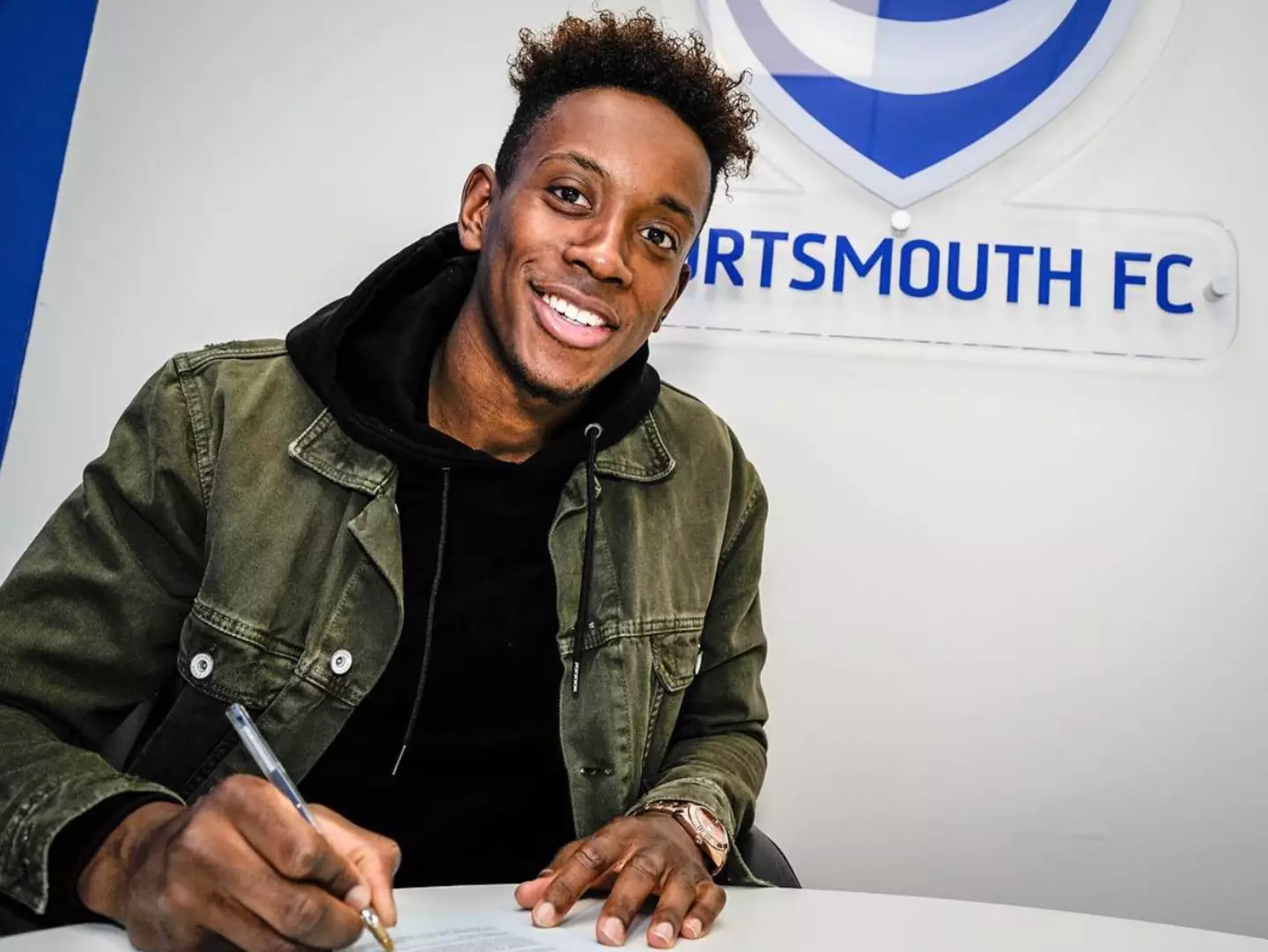 A life-changing moment. Jamal signs a deal with League Two side Portsmouth. Image credit: @jamzlowe/Instagram