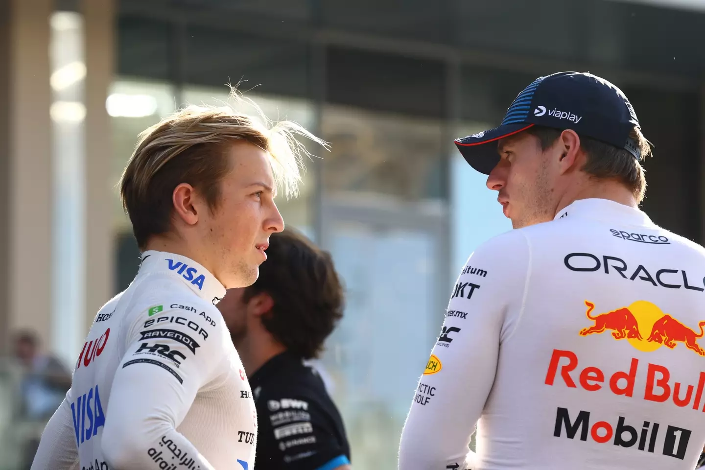 Liam Lawson of Visa Cash App RB talks to Max Verstappen prior to Abu Dhabi GP. Image credit: Getty