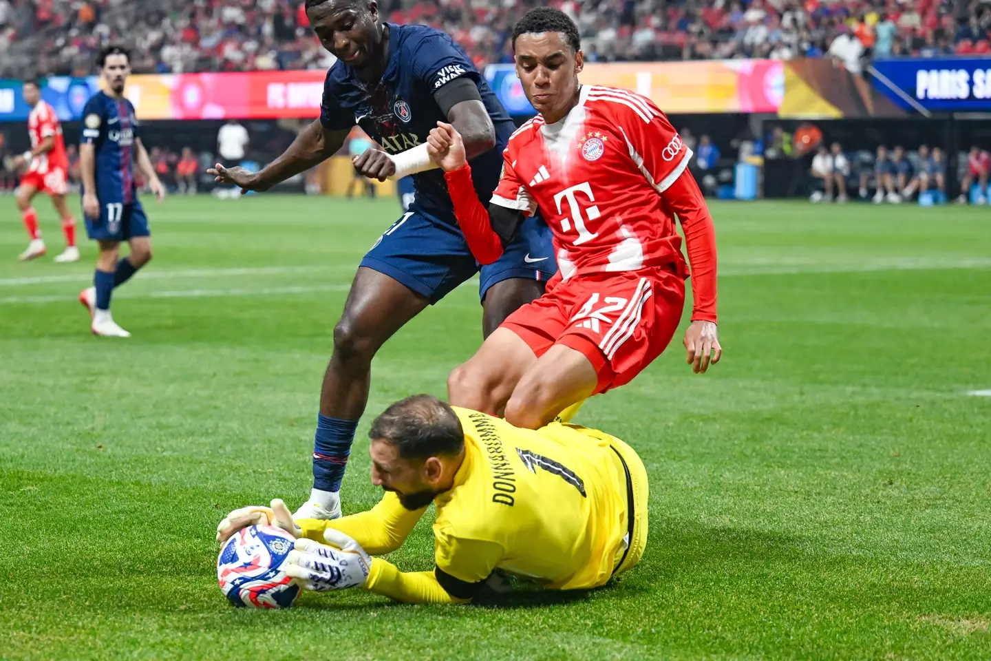 Jamal Muisala will be out for a long period after colliding with Gianluigi Donnarumma. Image: Getty