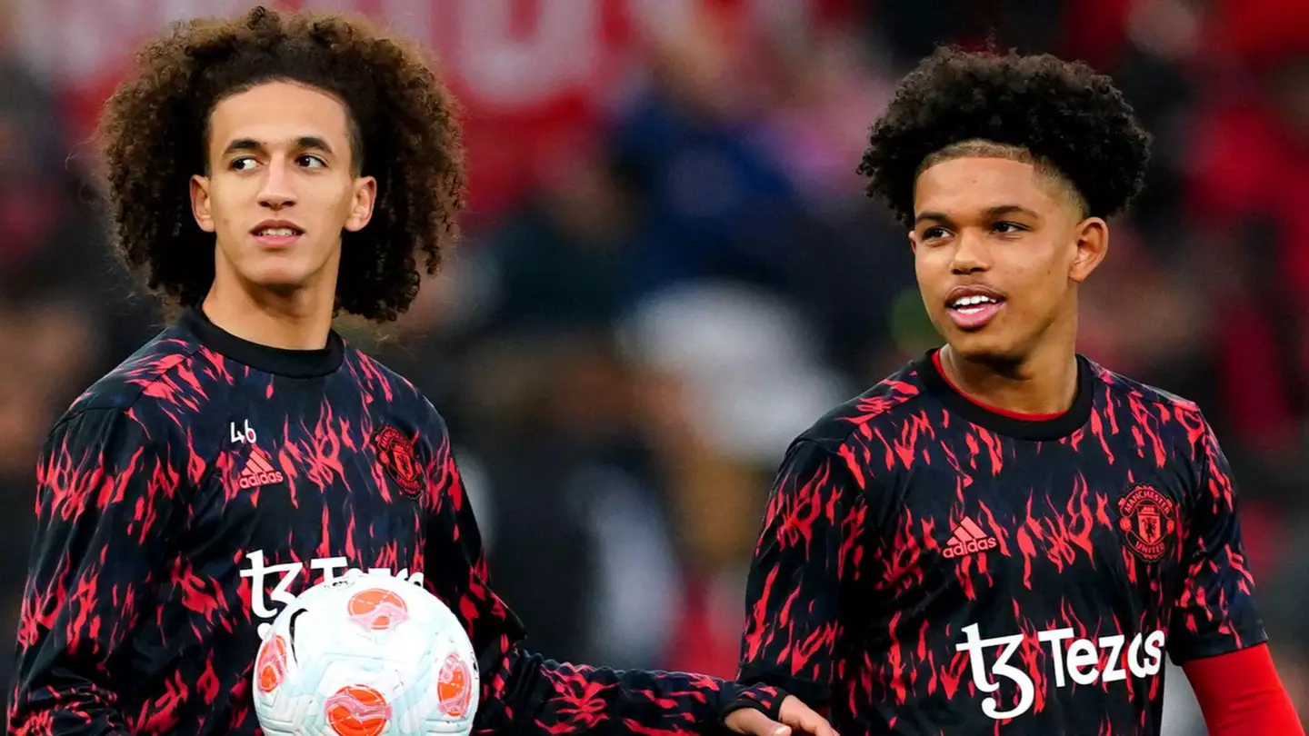 Hannibal Mejbri and Shola Shoretire warm up at Old Trafford (Alamy)