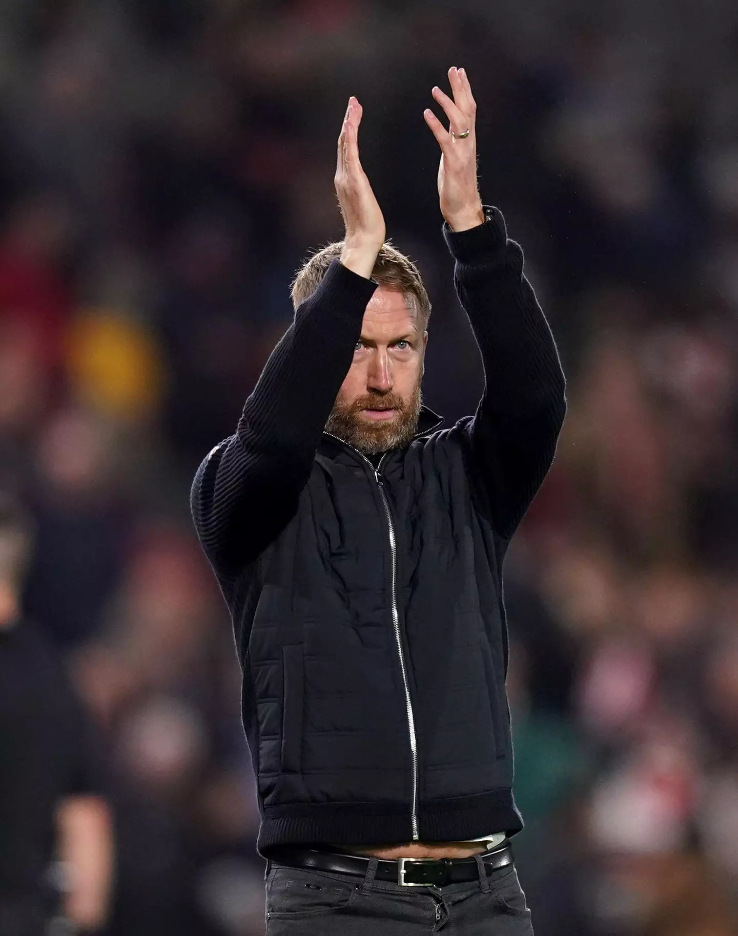 Chelsea manager Graham Potter applauds the fans after the Premier League match at the Gtech Community Stadium. (Alamy)