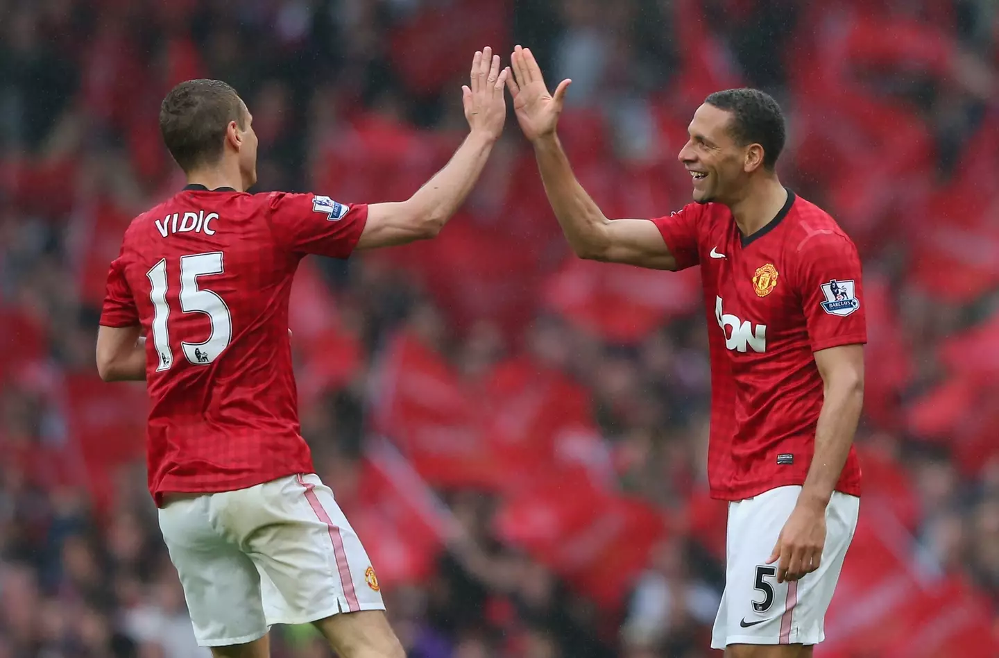 Nemanja Vidic and Rio Ferdinand celebrate a goal for Manchester United. Image: Getty
