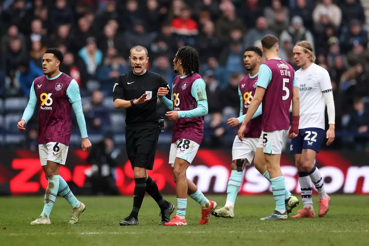 Referee Andrew Kitchen and Hannibal Mejbri after the incident. Image credit: Getty