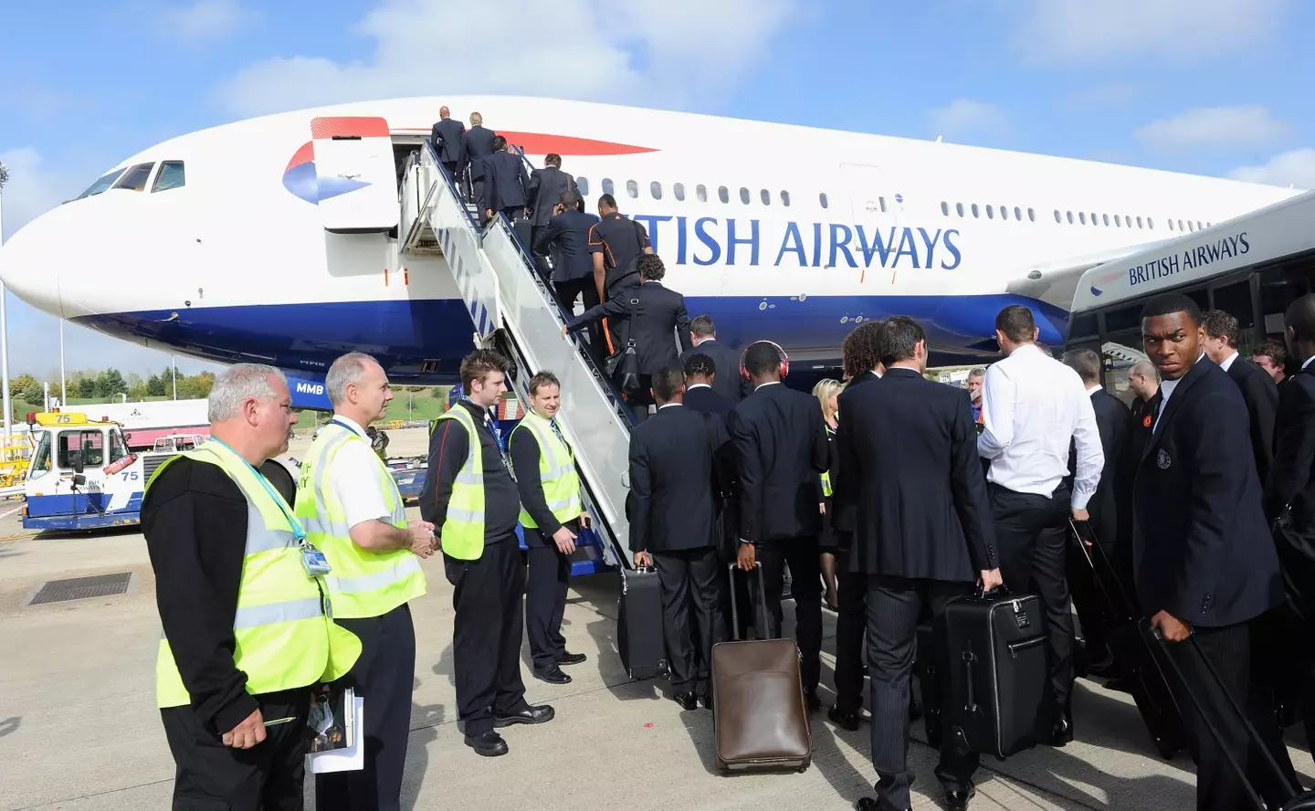 Chelsea players boarding a plane. (