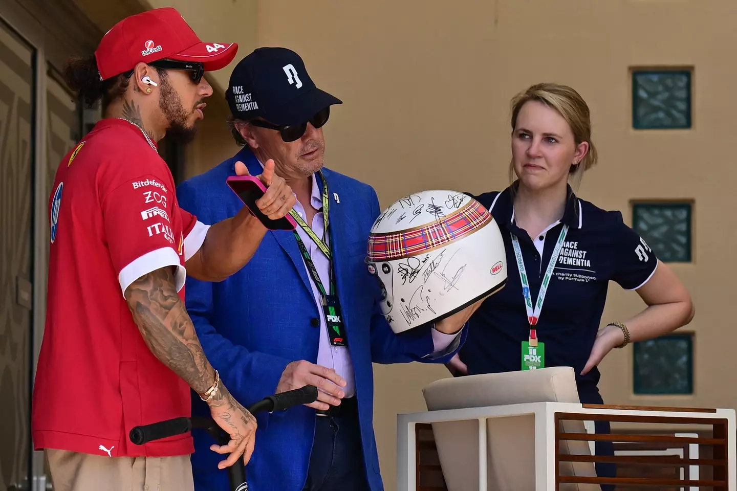 Michael Schumacher has signed Jackie Stewart's helmet. Image: Getty