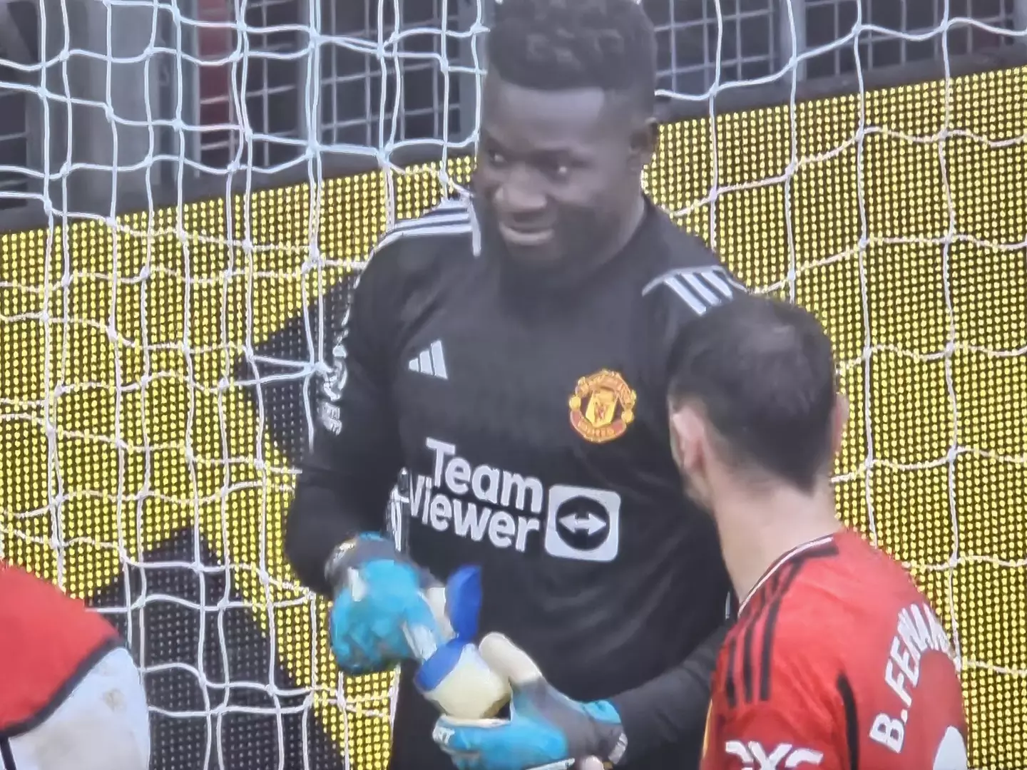 Andre Onana puts vaseline on his gloves. Image: Sky Sports