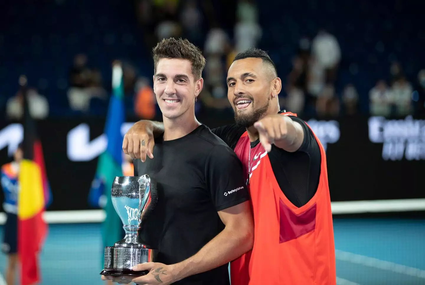 Thanasi Kokkinakis and Nick Kyrgios pose after the men's doubles final match at Aus Open.