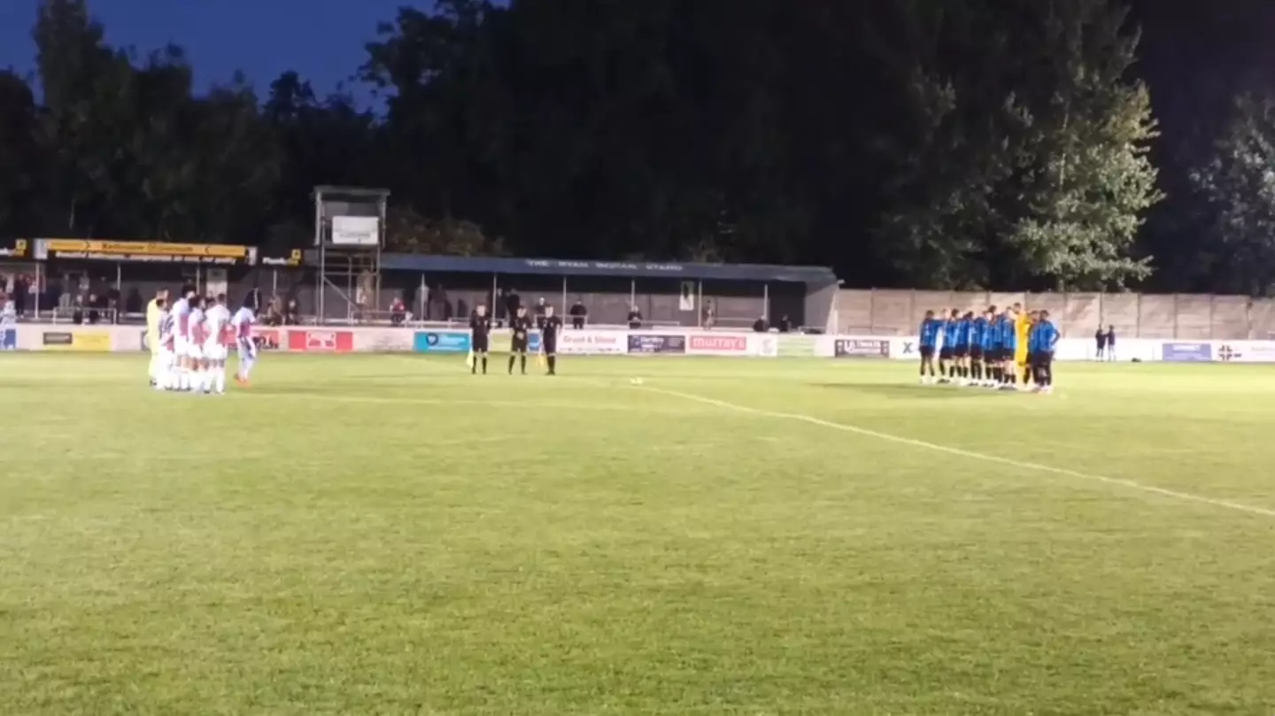 Chesham and Bracknell players on the centre circle for the singing of God Save The King. Image: Twitter