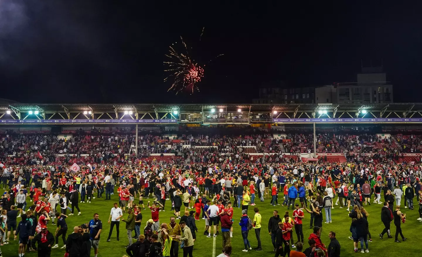 Forest fans on the pitch after the win over Sheffield United. Image: PA Images