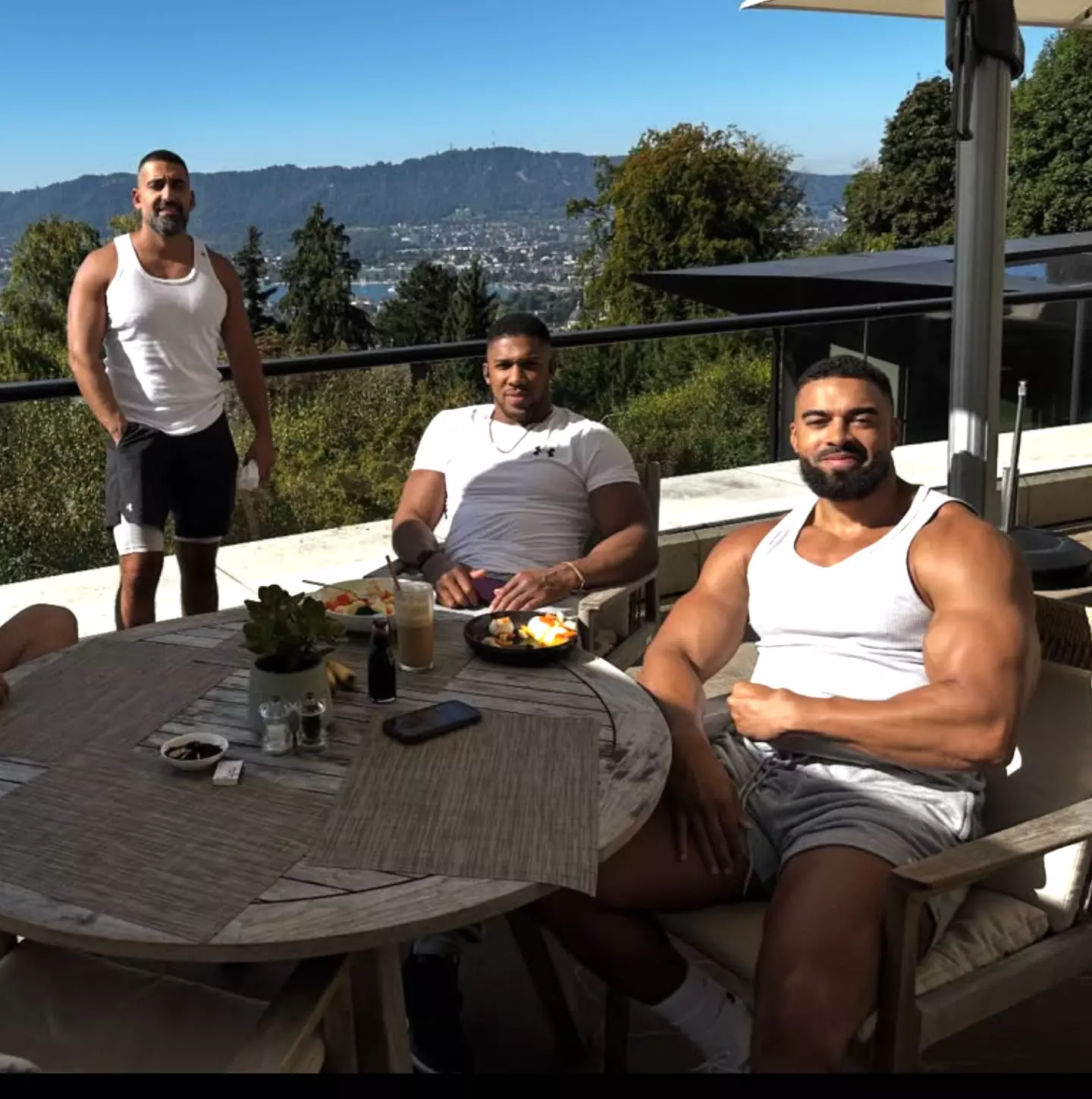 Sina Ghami (left), Anthony Joshua (centre) and Latif "Latz" Ayodele (right) (Credit:Instagram)