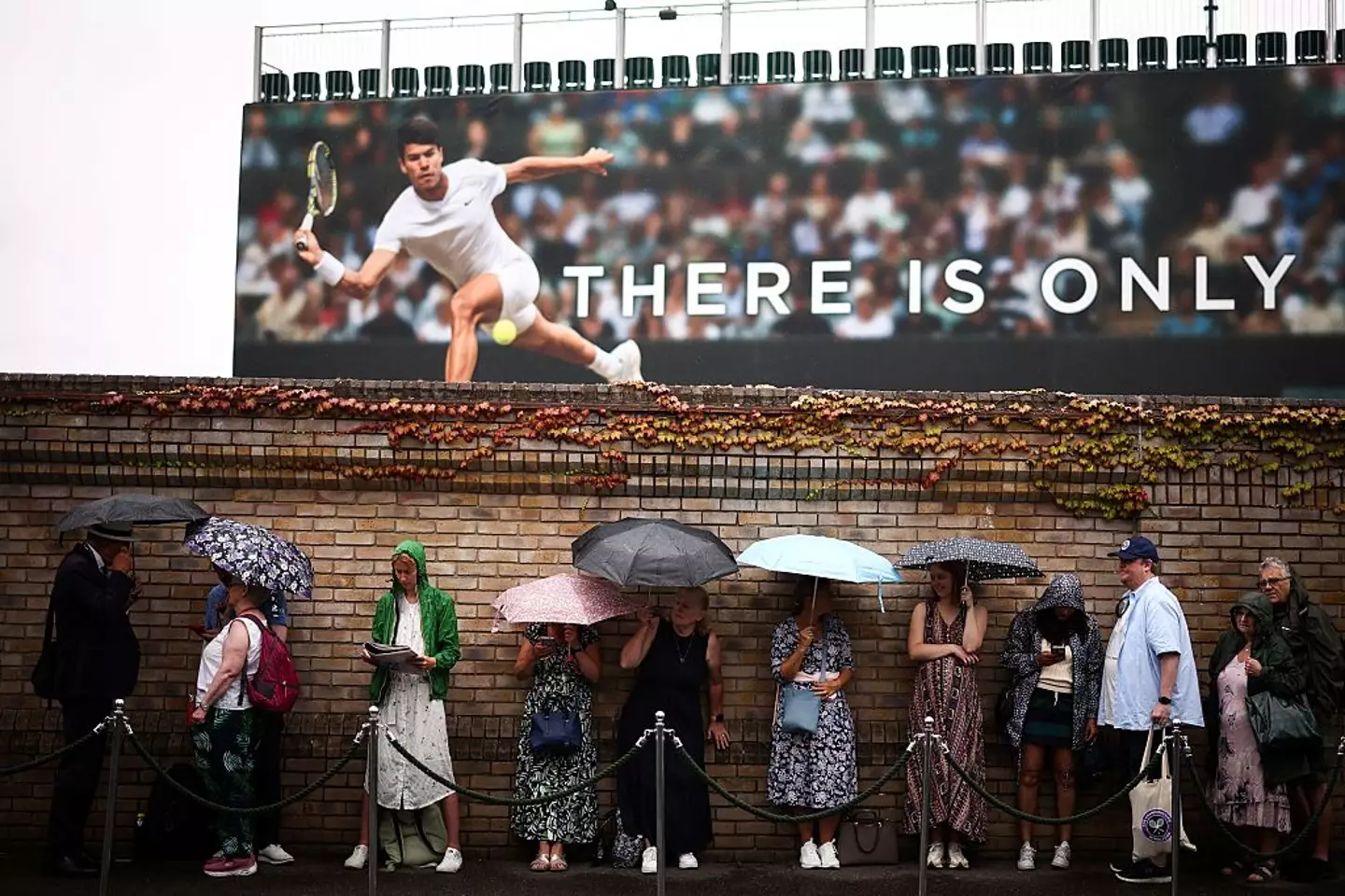 The Wimbledon ticket queues get bigger every year (Getty/HENRY NICHOLLS)