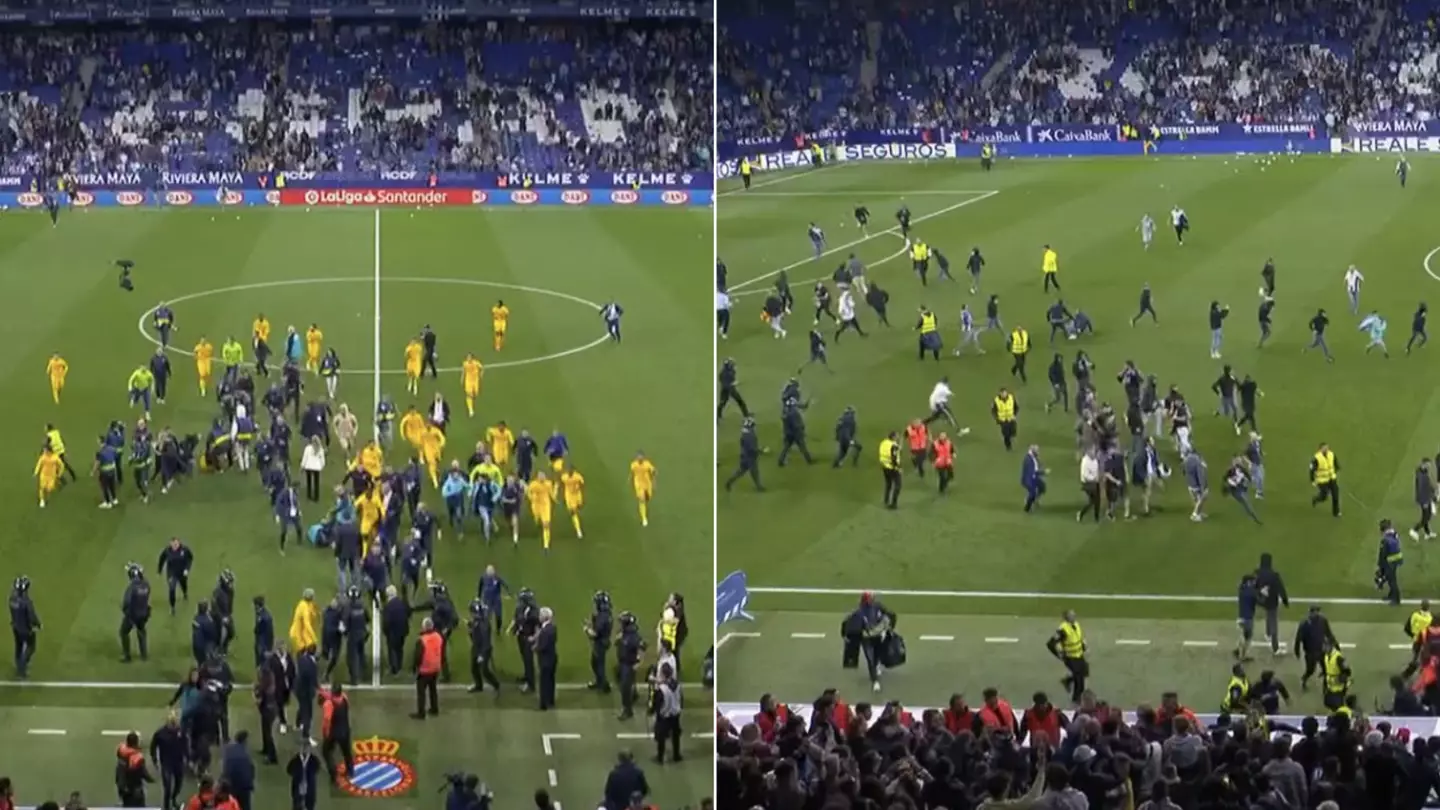 Barcelona players dart down the tunnel as Espanyol fans chase them after title win