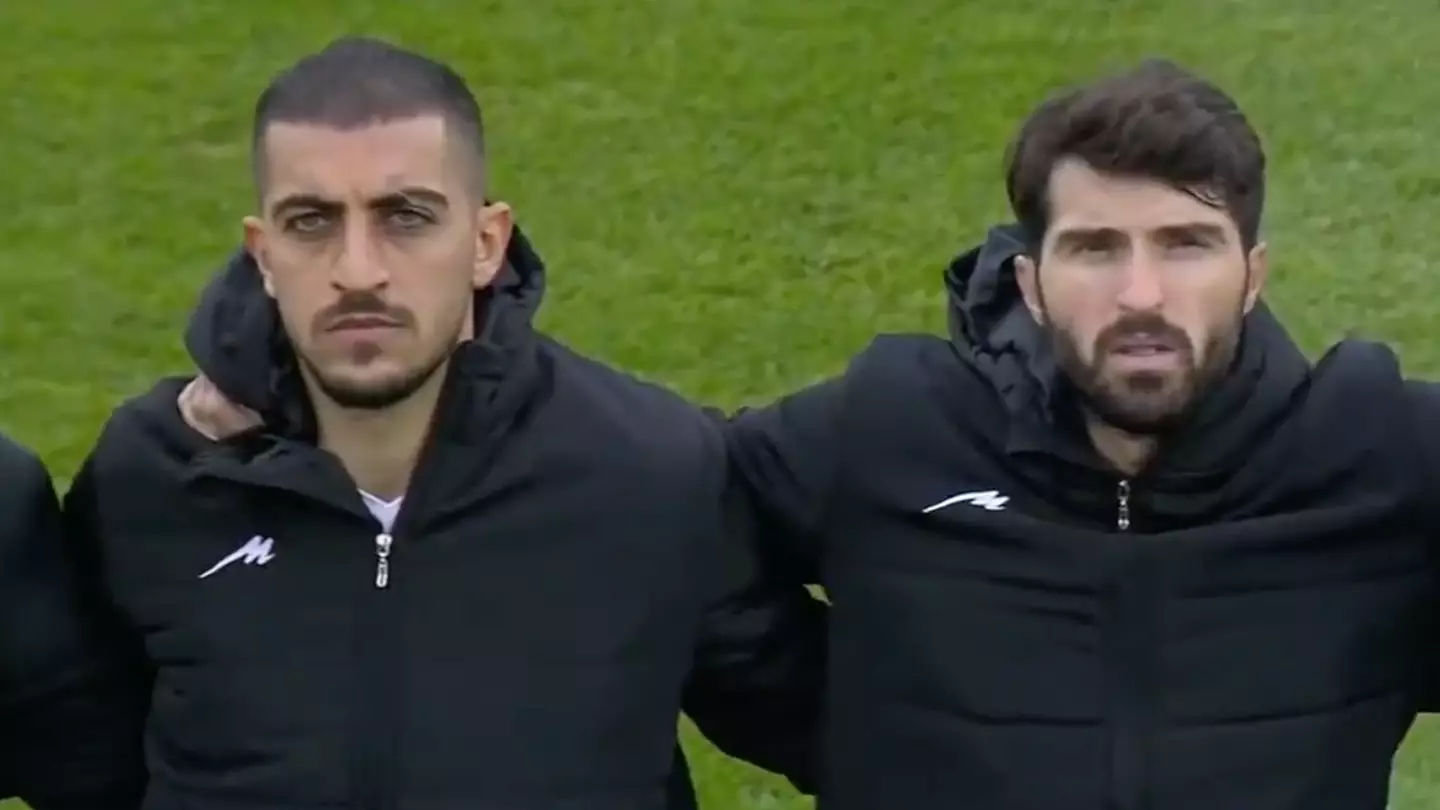 Iran players refuse to show country's crest during national anthem in powerful protest
