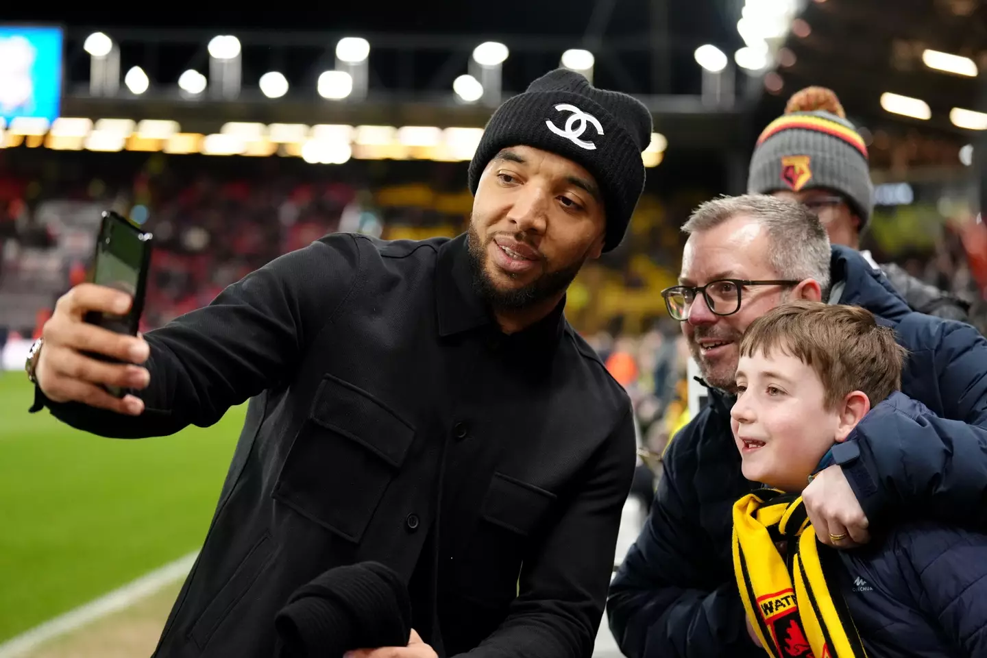 Deeney taking pictures with Watford fans. Image: Alamy