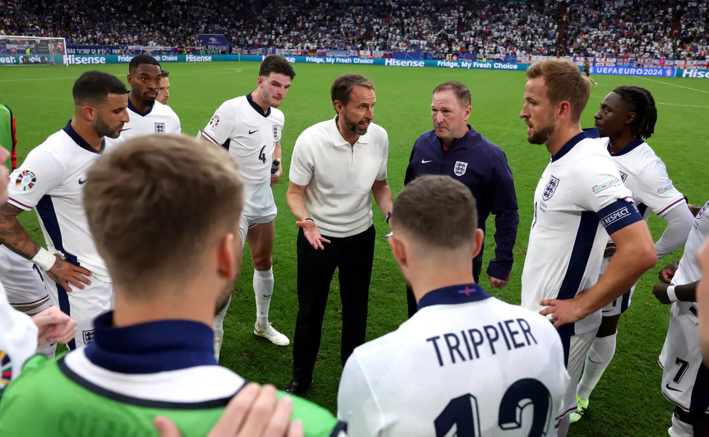 Gareth Southgate speaks to the England team during their game against Slovakia. Image: Getty
