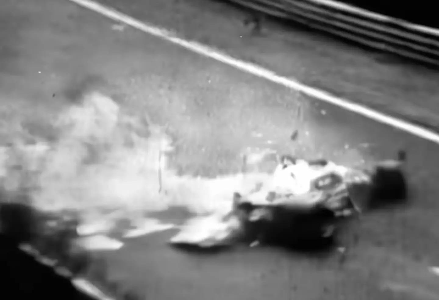 Lauda's car set alight after hitting a wall, but it was a subsequent hit by another car that significantly worsened the fire (Image: F1)