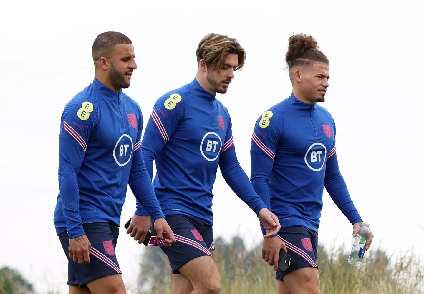 Walker and Phillips with City teammate Jack Grealish. (Image