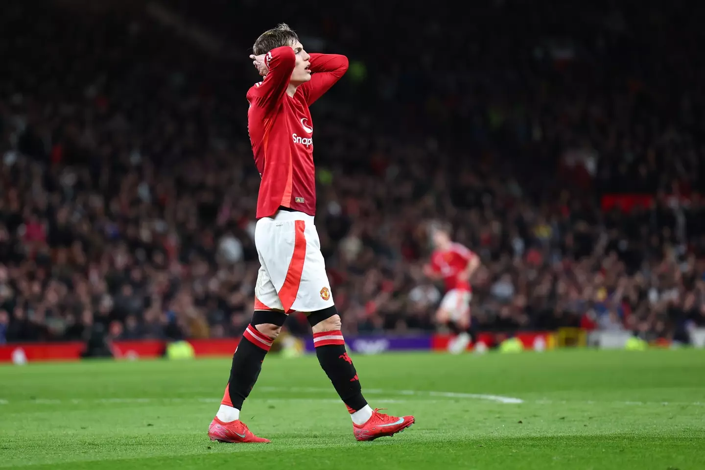 Alejandro Garnacho cuts a frustrated figure during Manchester United vs. Fulham. Image: Getty