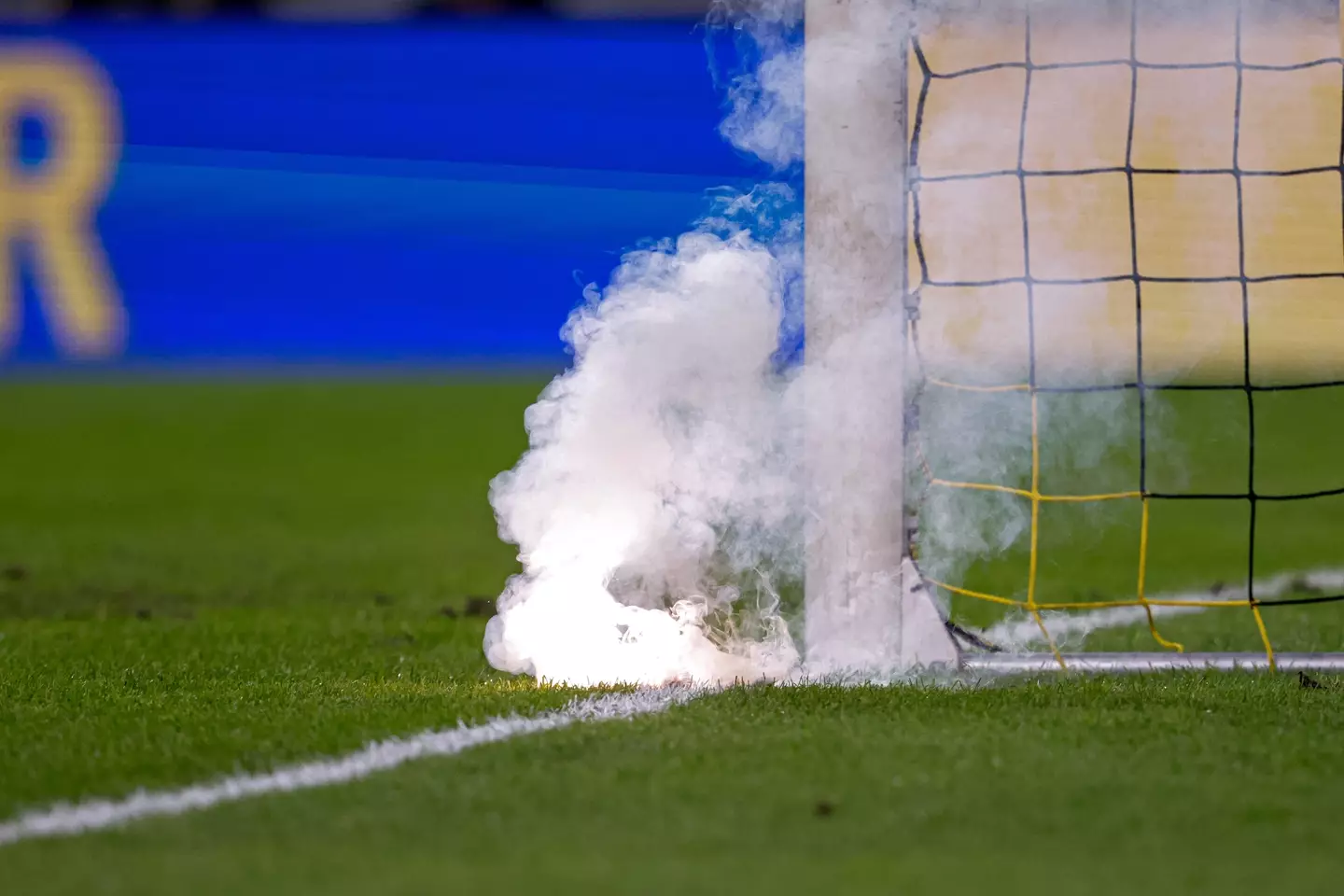 Fireworks were also thrown on the pitch. Image: PA Images