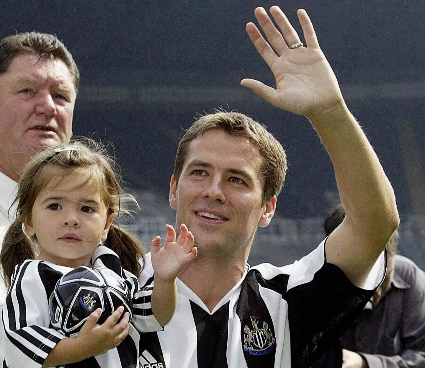 Michael Owen holding two-year-old Gemma back in 2005, whilst being introduced to Newcastle United fans. Image: Alamy