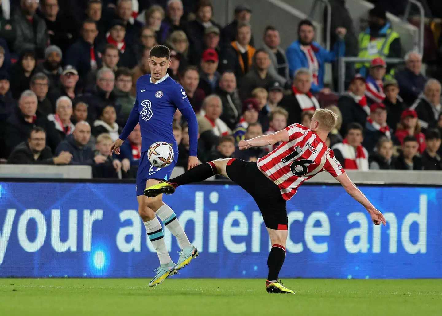 Ben Mee of Brentford challenges Kai Havertz of Chelsea. (Alamy)