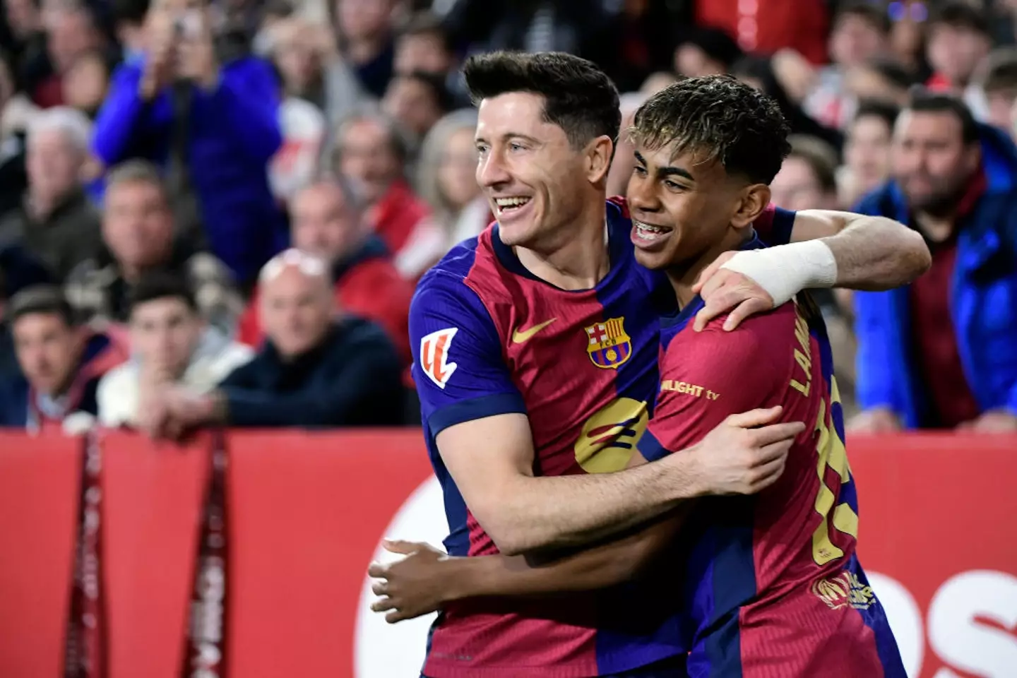 Ballon d'Or nominees Lamine Yamal and Robert Lewandowski (Image: Getty)