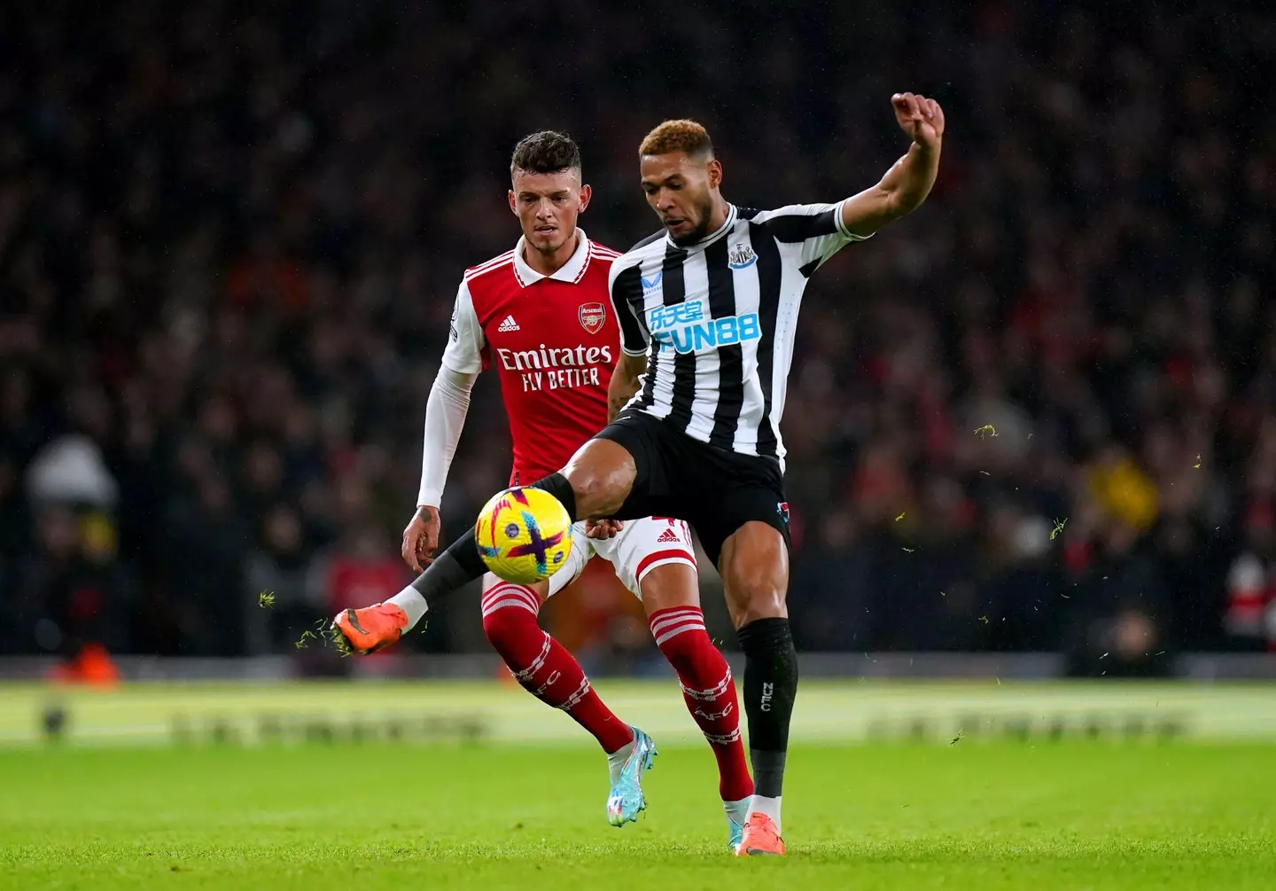 Joelinton battles for the ball during Newcastle's 0-0 draw with Arsenal. Image: Alamy