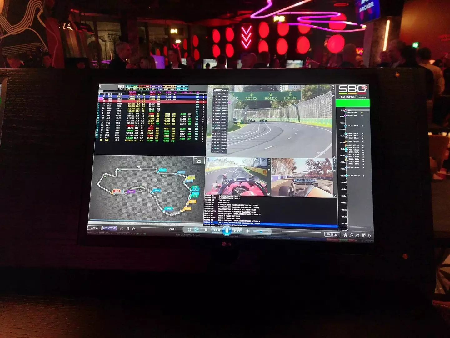 Watch highlights and check data from classic races on the screens. Image: F1 Arcade