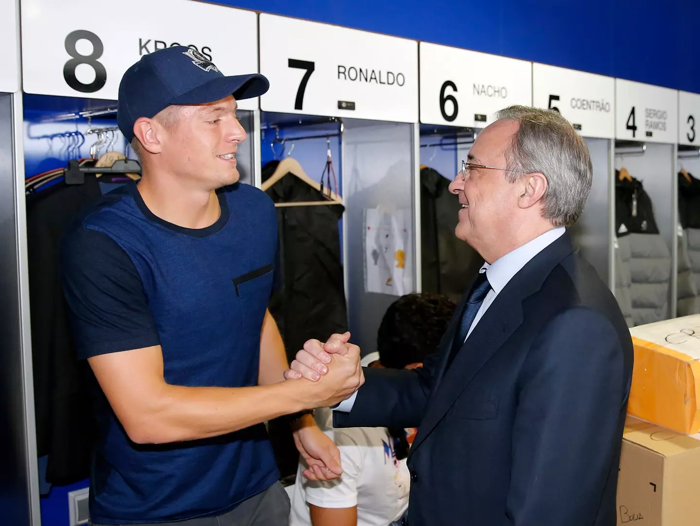 Toni Kroos and Florentino Perez share an embrace. Image: Getty