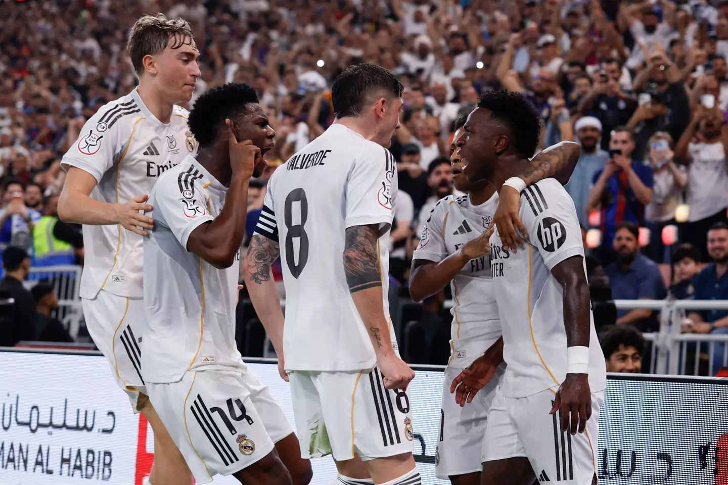 Valverde celebrates with his Real Madrid teammates. Image credit: Getty