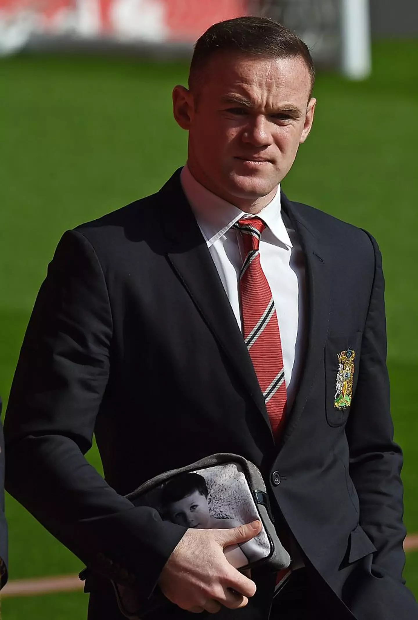 Wayne Rooney wearing the Manchester United club blazer (Credit:Getty)
