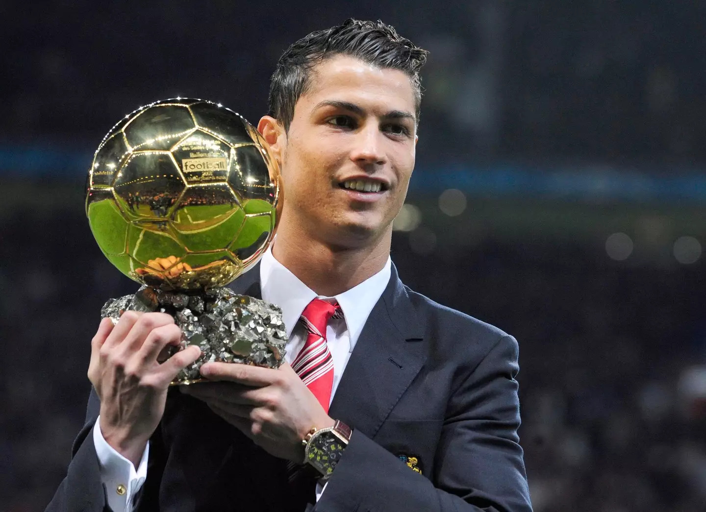 Cristiano Ronaldo pictured with the Ballon d'Or first place trophy in 2008 (