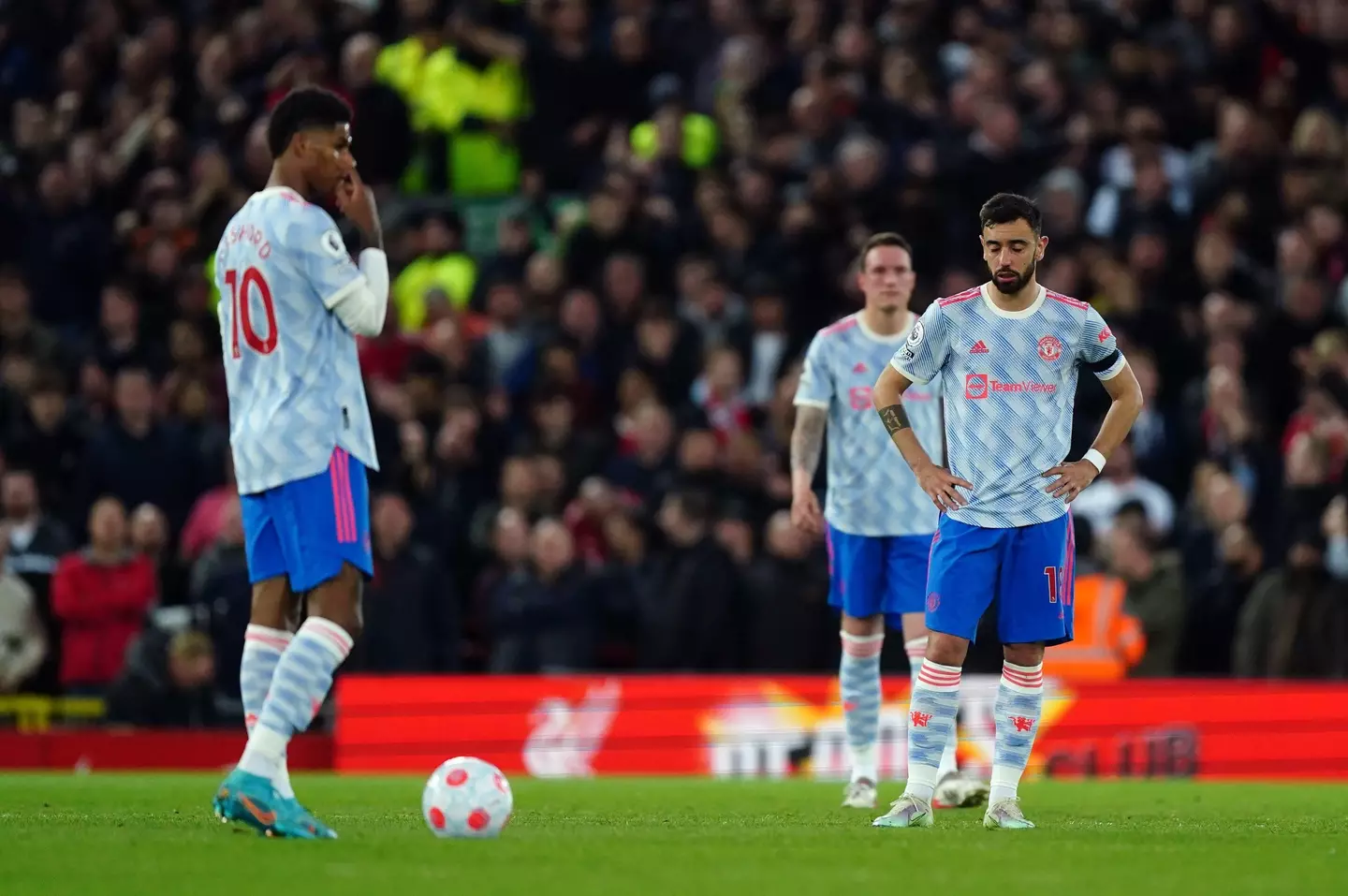 Manchester United players dejected after Salah's goal. Image: PA Images