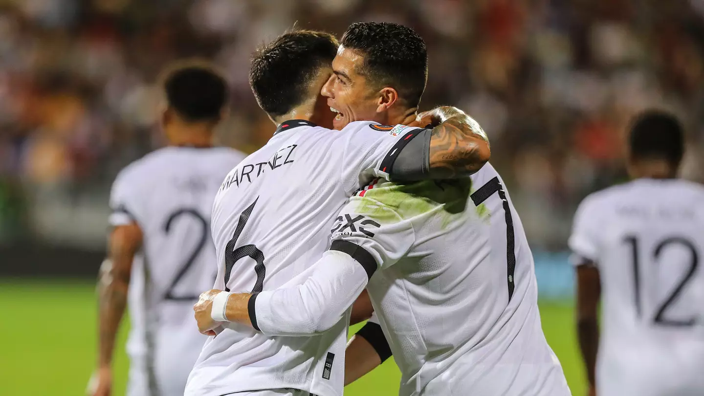 Cristiano Ronaldo and Lisandro Martinez. (Alamy)