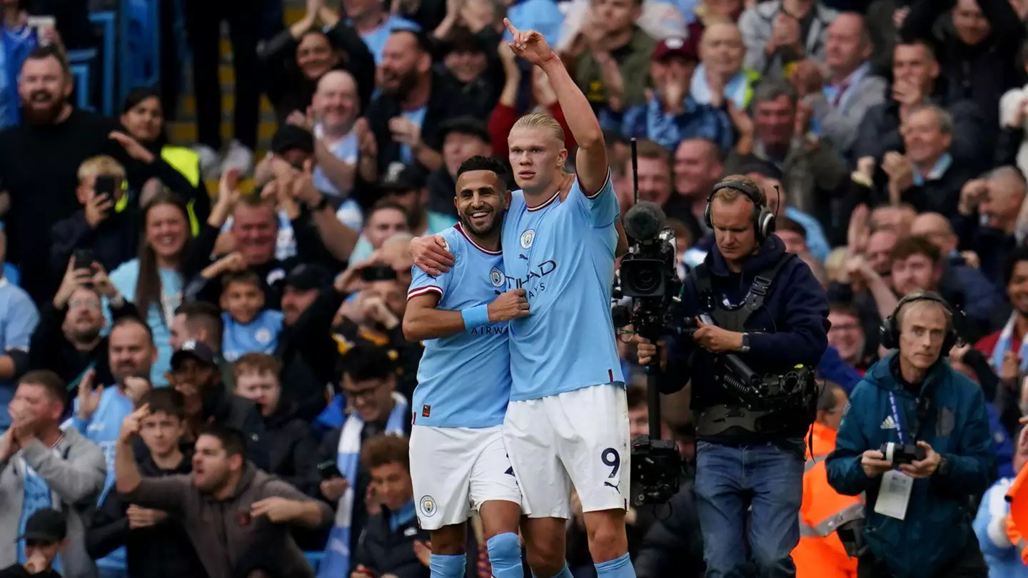 Manchester City's Erling Haaland celebrates with Riyad Mahrez (PA Images/Alamy)