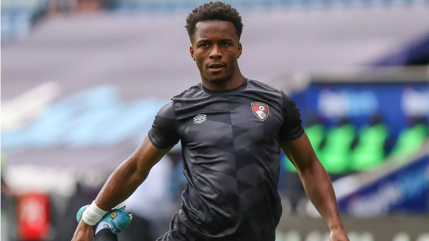 Ethan Laird warming up ahead of AFC Bournemouth's match against Coventry City. (Alamy)