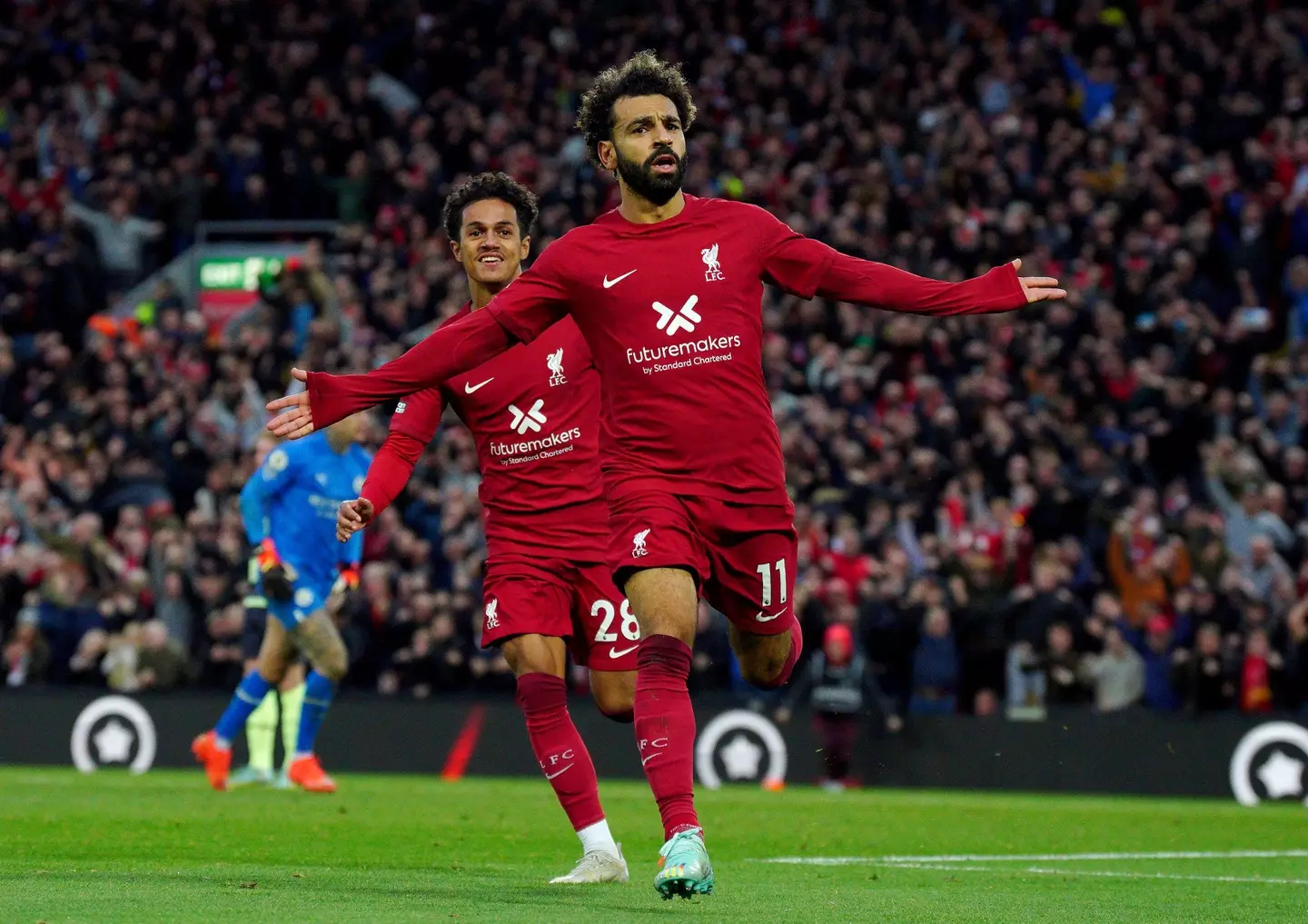 Mohamed Salah wheels away in celebration after scoring against Man City. Image: Alamy